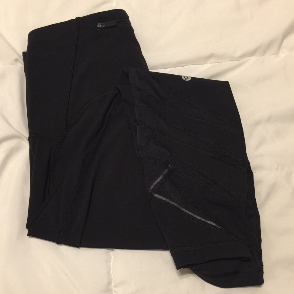 Lululemon Motionful 7/8 reflective mesh size 8
